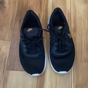 Nike sneakers black and gold